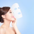 Relax Young woman with cloth facial mask Royalty Free Stock Photo