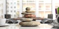 Zen stones stack on a desk, office background. 3d illustration Royalty Free Stock Photo