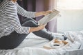 Relaxation and recreation, Young happiness woman on the bed with Royalty Free Stock Photo