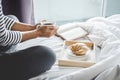 Relaxation and recreation, Young happiness woman on the bed with Royalty Free Stock Photo