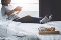 Relaxation and recreation, Young happiness woman on the bed with Royalty Free Stock Photo