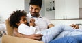 Relaxed african american family watching tv