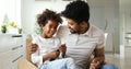 Relaxed african american family watching tv Royalty Free Stock Photo