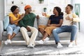 Relaxed african american friends having home party Royalty Free Stock Photo