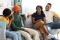 Relaxed african american friends having home party Royalty Free Stock Photo