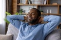 Relaxed african american man enjoying quiet time and comfort at home Royalty Free Stock Photo