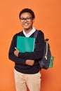 relaxed african american schoolboy in uniform