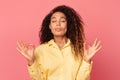 Relaxed african american woman doing yoga gesture Royalty Free Stock Photo