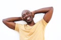Relaxed african guy smiling with his hands behind head Royalty Free Stock Photo