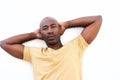 Relaxed african guy standing against white background Royalty Free Stock Photo