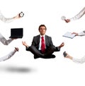 Relaxed businessman that does yoga during the work