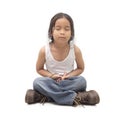 Relaxed child practicing yoga on a white