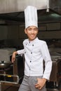 Relaxed Chinese kitchen manager Royalty Free Stock Photo