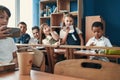 Relaxed classmates having fun at the school break Royalty Free Stock Photo