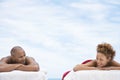 Relaxed Couple Lying On Massage Tables