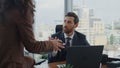 Relaxed coworkers communicating office closeup. Woman sharing ideas with manager Royalty Free Stock Photo