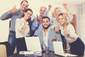 Relaxed employees sitting at desk