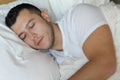 Relaxed ethnic male sleeping like a baby Royalty Free Stock Photo