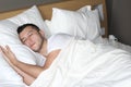 Relaxed ethnic male sleeping like a baby Royalty Free Stock Photo