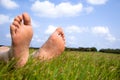 Relaxed foot on grass Royalty Free Stock Photo