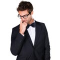 Relaxed yet formal. Studio shot of a handsome young man wearing a tuxedo. Royalty Free Stock Photo