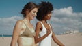 Relaxed girls going beach in sunlight closeup. Attractive girlfriends on date Royalty Free Stock Photo