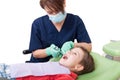 Relaxed kid on dentist chair Royalty Free Stock Photo