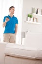 Relaxed man having with a smart-phone Royalty Free Stock Photo