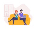 Relaxed man and woman sitting on couch browsing internet use laptop chatting on smartphone