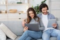 Relaxed man and woman spending weekend at home Royalty Free Stock Photo