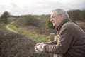 Relaxed mature man outdoors Royalty Free Stock Photo