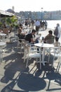 Relaxed pavement cafe at the charming, historic Venetian harbor at Hania, Greece