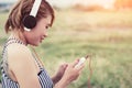 Relaxed woman breathing and listening music from a smartpho Royalty Free Stock Photo