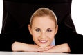 Relaxed smile business woman lying on the desk