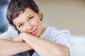 Relaxed smile. Closeup portrait mature business woman smiling at you.