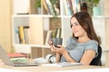 Relaxed student resting drinking coffee at home