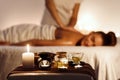 Relaxed woman enjoying aromatherapy massage in luxury spa Royalty Free Stock Photo