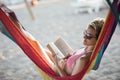 Relaxed woman laying in hammock Royalty Free Stock Photo