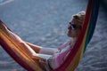 Relaxed woman laying in hammock Royalty Free Stock Photo