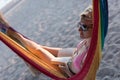 Relaxed woman laying in hammock Royalty Free Stock Photo