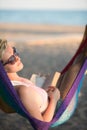 Relaxed woman laying in hammock Royalty Free Stock Photo