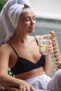 Relaxed Woman With Lemon Water. Young Bathrobe Girl Relaxing With Glass Of Water