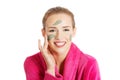 Relaxed woman with a nourishing face mask Royalty Free Stock Photo