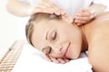 Relaxed woman receiving an acupuncture treatment Royalty Free Stock Photo