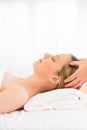 Relaxed Woman Receiving Head Massage At Health Spa Royalty Free Stock Photo