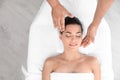 Relaxed woman receiving head massage Royalty Free Stock Photo