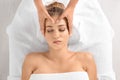 Relaxed woman receiving head massage Royalty Free Stock Photo