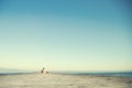 Relaxed woman resting after a long journey with her big suitcase Royalty Free Stock Photo