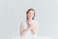 Relaxed woman sitting at the table with closed eyes Royalty Free Stock Photo