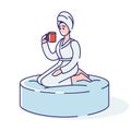 Relaxed woman in towel and bathrobe drinks tea after bath, relaxing massage or sauna in spa salon